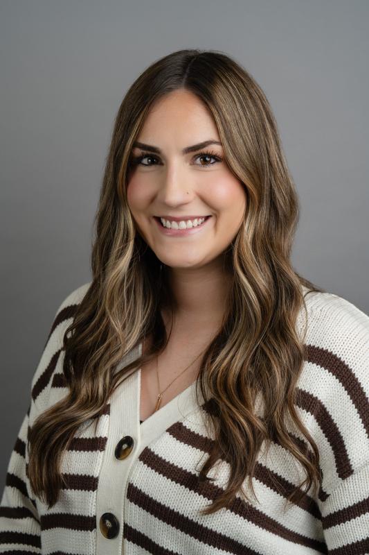 a headshot of a woman smiling